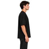 DAWIS Oversize T-Shirt in Schwarz aus schwerer Baumwolle mit Front- und Backprint in Seitenansicht